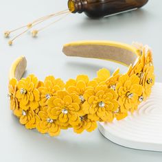 - Applique design
- Rhinestone embellished
- Length: 6.2 inch, Width: 4.9 inch
- Material: 100% Polyester, 100% Zircon Flower Headband, Home Jewelry, Yellow, Design