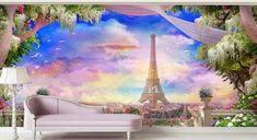 the eiffel tower is surrounded by flowers and greenery in front of a backdrop