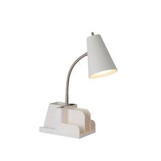 a desk lamp with a white shade on the top and bottom, in front of a white background