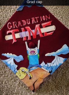 a graduation cap with the words graduation time painted on it and an image of spongebob