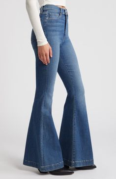 "Find FRAME Le Super Flare High Waist Jeans on Editorialist. A superhigh waist balances the floor-sweeping flared legs of '70s-inspired jeans crafted from shape-retaining stretch denim. 34\" inseam; 31\" leg opening; 12 1/2\" front rise; 16 1/2\" back rise (size 29) Zip fly with button closure Five-pocket style 90% cotton, 6% elasterell-p, 4% elastane Machine wash, dry flat Imported" Boot Leg Jeans Outfits, 70s Denim Outfit, Europe Clothing, Flared Jeans 70s, 70s Jeans, Super Flare Jeans, Bootleg Jeans, Cute Nike Shoes, Jeans Fashion