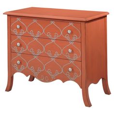 an orange dresser with two drawers and silver knobs on the front, against a white background