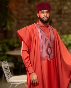 Elevate your style with our Custom-Made Men's Agbada Set - a perfect blend of tradition and modern elegance. This stunning Agbada features a rich teal color with intricate embroidery on the chest panel, reflecting the craftsmanship and attention to detail that goes into every piece. The design is tailored for a relaxed yet sophisticated fit, ideal for special occasions or cultural events. Key Features: *Material: Premium-quality fabric for a luxurious feel and long-lasting wear. *Color: Availabl Ceremonial Agbada For Eid With Traditional Drape, Traditional Groom's Agbada For Festive Occasions, Traditional Agbada For Groom In Festive Season, Traditional Festive Agbada For Groom, Eid Agbada For Traditional Ceremonies, Agbada Styles Men, Agbada For Men, Latest African Men Fashion, African Clothes