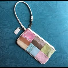 Super Cute Coach Wristlet With Patches Of Color And Coach Embroidery On Both Sides. Zipper Works Perfectly And Inside Is Clean. Nearly Brand New Multicolor Coach Bags As Gifts, Trendy Coach Rectangular Clutch, Trendy Rectangular Coach Clutch, Coach Rectangular Zipper Pouch, Coach Multicolor Clutch Bag, Coach Multicolor Travel Wristlet, Multicolor Coach Clutch Bag, Coach Multicolor Wristlet For Travel, Coach Rectangular Wristlet With Zipper Pouch