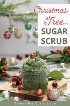 christmas tree sugar scrub in a glass jar on a cutting board