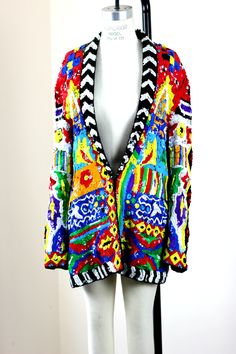 "This is a WOW, one fabulous one of a kind fabulous Jacket!! The colors, the style...it is fantastic!! Excellent Measuring: 30\" length Bust: 40\" Hip: 44\" Sleeves: 25\" This is absolutely fabulous, rare and fabulous! Pet Free/smoke free Enjoy!" Multicolor Embellished Outerwear For Winter, Fitted Multicolor Sequined Outerwear, Embellished Multicolor Outerwear For Spring, Multicolor Embellished Outerwear For Spring, Fall Multicolor Beaded Outerwear, Embellished Multicolor Party Outerwear, Multicolor Embellished Party Outerwear, Festive Multicolor Embellished Outerwear, Festive Multicolor Outerwear For Festivals