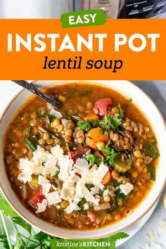 a bowl of instant pot lentil soup with parmesan cheese and fresh herbs