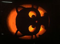 a cat pumpkin carved into the shape of a jack o lantern