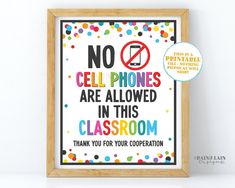 there is a sign that says no cell phones are allowed in this classroom