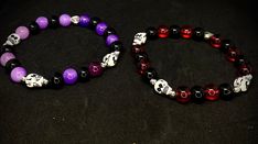 Trick or treat your wrist with this bewitching Halloween Purple and Red glass bead skull bracelet! This spooky accessory is infused with a devilishly delightful spirit. Whether you're channeling your inner Dia de los Muertos enthusiast or simply want to stand out in style, this handmade bracelet will add a macabre touch to any ensemble. It's time to embrace the eerie and flaunt your fashion sense like never before! Beads may vary in texture, size, and color.  Length is 7.25" as shown but can cho Gothic Skull Print Bracelets As Gift, Gothic Halloween Bracelets Gift, Gothic Halloween Bracelets As A Gift, Gothic Bracelets For Halloween Gift, Gothic Wristband Bracelet Gift, Halloween Skull Bracelets With Skull Print, Handmade Bracelets For Halloween Party, Halloween Skull Print Bracelet Gift, Red Beaded Bracelets For Halloween Gift