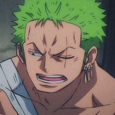 an anime character with green hair and piercings on his ears looking at the camera