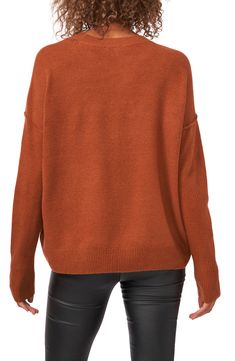 Exposed seams add soft structure to a cozy staple sweater you'll wear on repeat. 22" front length; 24" back length (size Medium) Crewneck Long sleeves Dropped shoulders Ribbed cuffs and hem 73% acrylic, 24% polyester, 3% spandex Hand wash, dry flat Imported Knit V-neck Sweater For Fall Layering, Versatile Solid Knit Sweater, Versatile Knit Sweater In Solid Color, Versatile Fall Sweater With Ribbed Neckline, Winter Cozy Fit Sweater With Ribbed Neckline, Versatile Knit Sweater, Cozy Sweater With Ribbed Neckline For Work, Cozy Fit Winter Sweater With Ribbed Neckline, Fall Cardigan With Ribbed Neckline