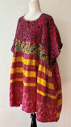 Artisan Kantha Bae Quilt Mini Dress. Dress falls just above the knee. With a high low hem, the dress is perfect for all ages. Soft, and Very Chic. An absolute favorite in daytime dresses. Why do we love it? Our best selling dress has been the midi version. Now... the shorter mini has been created. Now a best seller, surpassing the midi. This dress is a perfect example of maximizing the use of mixed prints to achieve a sophisticated fashion statement.The style is fresh, mixed prints engineered cr Lagenlook Tunic Dress For Festivals, Festival Lagenlook Tunic Dress, Bohemian Cotton Dress With Asymmetrical Hem, Kantha Quilting, Clothing Projects, Sophisticated Fashion, Mixed Prints, Dress Comfortable, Daytime Dresses