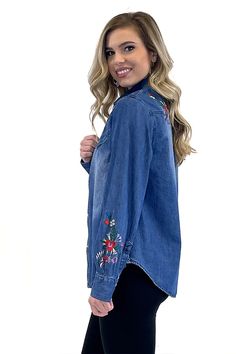 Look sharp in the Jesse Embroidered Denim Shirt—crafted from dark denim with floral embroidery for a classic western style. Feel confident and look fashionable with this timeless piece for any occasion! Embroidered Denim Blue Button-up Top, Embroidered Button-up Denim Blue Top, Denim Blue Long Sleeve Tops With Floral Embroidery, Medium Wash Floral Embroidery Button-up Top, Medium Wash Denim Top With Floral Embroidery For Spring, Embroidered Long Sleeve Denim Top For Spring, Casual Denim Top With Floral Embroidery For Spring, Spring Embroidered Tops For Rodeo, Casual Floral Embroidered Denim Top For Spring