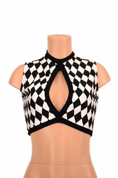 "This item is made to order, please read all the way through the listing before purchasing! This crop top is made from four way stretch lycra spandex in uv glow black and white diamond print Black mystique metallic fabric accents around the middle opening, neckline, and hemline. It features a keyhole design in front, with a high back, and fits like a glove! TOP LENGTH: Underarm to hemline measures 8\" Womens Sizing (See below for instructions on where measurements should be taken) XXS: Bust 29\" Cheap Black Top With Geometric Pattern, Cheap Cosplay Top With Front Print, Glove Top, Keyhole Top, Diamond Print, Metallic Fabric, White Diamond, Womens Clothing Tops, Crop Top