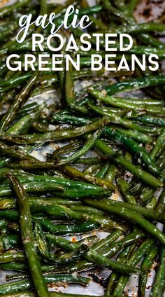 garlic roasted green beans in a pan with text overlay that reads garlic roasted green beans