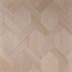 an image of wood flooring that looks like it is made out of herringbones