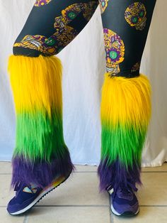 We have you covered- stay warm from your head to your toes! These fun and fuzzy leg warmers are the most coveted Mardi Gras accessory and we have them for kids and adults. Match your littles and rock the warmest and cutest accessory while you catch all the throws this parade season! Laissez les bon temps rouler. Comes in Youth and Adults sizes. Black elastic band which fits most legs. Fuzzy Leg Warmers, Metal Mask, Feather Mask, New Orleans Mardi Gras, Beaded Hat, Polo Shirt Dress, Mardi Gras Beads, Gold Stripes, Halloween Skull