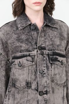 The Jaya Jacket is an oversized black acid wash denim jacket that combines classic style with modern versatility. Featuring a fold-over point collar, it includes both chest and side pockets for practicality, while the traditional jacket cuffs enhance its timeless appeal. The unique texture and aesthetic make it an essential layering piece for any wardrobe. Washed Black Button-up Outerwear, Stonewashed Grunge Outerwear For Fall, Oversized Acid Wash Denim Jacket For Fall, Fall Stonewashed Grunge Outerwear, Fall Grunge Stonewashed Outerwear, Oversized Washed Black Denim Jacket In Grunge Style, Oversized Washed Black Grunge Denim Jacket, Oversized Washed Black Denim Jacket Grunge Style, Classic Oversized Washed Denim Jacket