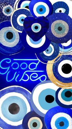 blue and white evil eyes with the words good vibe on it