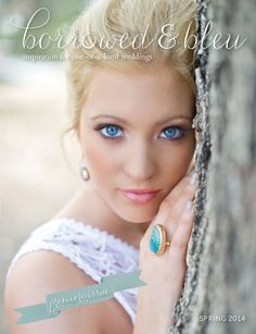 a beautiful young woman leaning against a tree