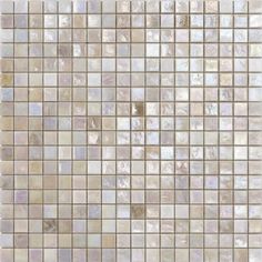 a white and beige mosaic tile wall