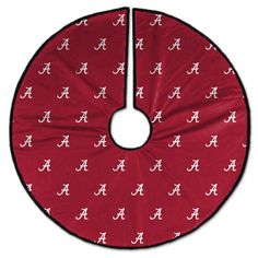 a red and white university of alabama tree skirt with the letter a in all over it