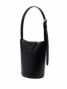 Trifolio bucket bag from SALVATORE FERRAGAMO featuring black, calf leather, engraved logo, gold-tone hardware, buckle fastening, foldover top and adjustable shoulder strap. Size Info UNI Color Detail Black Made In Italy Material Calf Leather 100% Season One Fall-Winter Season Two Fall-Winter Product bags.. Brand Ferragamo Size And Fit Width 11,81 in / 30 cm Height 7,48 in / 19 cm Depth 3,94 in / 10 cm Handle 11,81 in / 30 cm Leather Engraved, Black Bucket Bag, Ferragamo Bag, Salvatore Ferragamo Bags, Leather Engraving, Black Bucket, Crossbody Tote Bag, Leather Bucket Bag, Leather Bucket