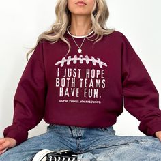 Stay cozy and stylish with the "I Just Hope Both Teams Have Fun" sweatshirt, a cute football sweater that's the ideal sports mom gift for gameday, halftime, and tailgating fun! Prefer this design on a T-Shirt? Visit this link: https://bohemianbloomdesigns.etsy.com/listing/1669765879 Everything You Need to Know: 🧥 Sweatshirt Brand Gildan | Unisex Adult Sizing | 50% Cotton, 50% Polyester ⏳🚚 Production & Shipping All items are made-to-order. They will ship within 1-5 business days from one of our Sports Mom Gifts, Football Sweater, Soccer Mom Shirt, Sports Sweatshirt, Football Mom Shirts, Shirt Football, Funny Girl, Fun Sweatshirts, Game Day Shirts