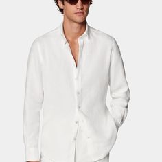 This casual white shirt is tailored to a relaxed fit, and features a single cuff and classic collar. Casual White Shirt, Tuxedo Pants, Scarf Hat, Pure Linen, Suspenders, White Shirt, Linen Fabric, Workout Shirts, The White