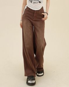 These brown jeans feature a loose fit and a heart-shaped patch on the back pocket with frayed edges, adding a unique vintage touch to their comfortable design • XS: Waist: 60cm/ 23.6 in, Hips: 84cm/ 33.1 in, Length: 102cm/ 40.2 in• S: Waist: 64cm/ 25.2 in, Hips: 88cm/ 34.6 in, Length: 103cm/ 40.6 in• M: Waist: 68cm/ 26.8 in, Hips: 92cm/ 36.2 in, Length: 104cm/ 40.9 in• L: Waist: 72cm/ 27.3 in, Hips: 96cm/ 37.8 in, Length: 105cm/ 41.3 in• XL: Waist: 76cm/ 29.9 in, Hips: 100cm/ 39.4 in, Length: 10 Mid-rise Brown Pants For Streetwear, Brown Jeans With Pockets For Fall, Brown Wide Leg Jeans With Pockets, Trendy Brown High-waist Jeans, Trendy Brown High Waist Jeans, Trendy High Waist Brown Jeans, Y2k Style Brown Wide Leg Pants, Brown Cotton Jeans For Streetwear, Y2k Wide Leg Brown Pants