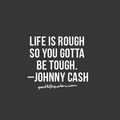 a black and white photo with the words life is rough so you gota be tough johnny cash