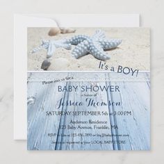 a baby shower is shown with starfish on the beach and it's a boy