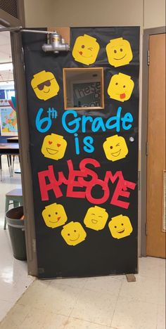 a classroom door decorated with legos and the words 6th grade is awesome