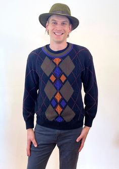 This is a cute 90s vintage menswear cotton argyle sweater by "Gant"! It's heavy and soft, in black with a unique hand intarsia brown, purple and coral argyle design on the front. The entire sweater, front and back, is intersected with windowpane lines of tiny pink hearts. The crew neckline stands out in brown edged with purple, and the long sleeves and hem are finished with ribbed knit in solid black. A sparsely arranged cable knit in the weave gives the sweater an extra hint of texture and chunkiness. Hand intarsia is a traditional knitting technique that gives a clean "inlaid" look when combining colors and is considered a "slow fashion" method of knitting.  It's in good clean condition with light normal wear, no flaws noted. The labels say "Gant, Hand Intarsia, 100% Cotton, L, Made in T Cotton Plaid-patterned Winter Sweater, Winter Cotton Argyle Sweater, Fitted Argyle Pattern Sweater For Fall, Fall Fitted Argyle Sweater, Fitted Argyle Sweater For Fall, Fall Season Argyle Sweater, Casual Cotton Sweater With Argyle Pattern, Casual Cotton Argyle Sweater, Retro Long Sleeve Argyle Sweater