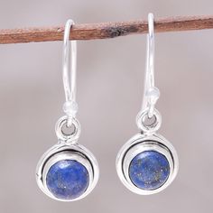 Crafted of deep blue lapis lazuli, two adorable moons form this pair of dangle earrings from India. Presented by Neeru Goel, the earrings are crafted of sterling silver with a high-polish finish. Pierced Lapis Lazuli Round Jewelry, Round Lapis Lazuli Gemstone Earrings, Silver Lapis Lazuli Round Earrings, Silver Round Lapis Lazuli Earrings, Nickel-free Lapis Lazuli Dangle Earrings, Nickel Free Lapis Lazuli Round Jewelry, Lapis Lazuli Dangle Earrings For Pierced Ears, Simple Silver Earrings, Lapis Lazuli Earrings