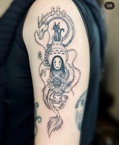 a woman with a tattoo on her arm