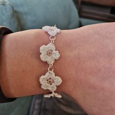 This gorgeous daisy chain bracelet is light and delicate to wear. Perfect to pair with any outfit and perfect as a gift for yourself or someone in your life especially when paired with the daisy chain necklace and stud earring for my collection. Delicate White Flower Bracelets, Delicate Spring Bracelet Jewelry, Adjustable Everyday Flower-shaped Jewelry, Hypoallergenic White Jewelry For Spring, Spring Hypoallergenic White Jewelry, White Flower Bracelets For Everyday, Handmade White Bracelet As Gift For Her, Adjustable Silver Daisy Jewelry, Feminine Bracelet Jewelry As A Gift