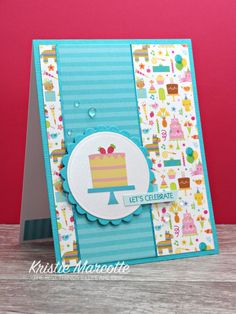 a card with a cake on it and the words let's celebrate written in blue