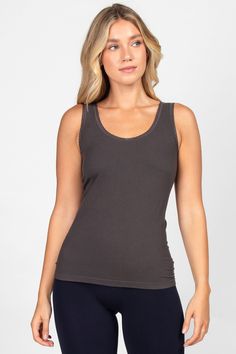 Classic tank made cozy. Soft, plush ribbing makes this the perfect top to layer this fall/winter while the lacey details elevate this style to make "the everyday" more special. Versatility in reversibility! Wear as a v-neck or scoop neck. Fall Tops With Lace Trim For Loungewear, Lace Trim Tops For Fall Loungewear, Fall Loungewear Tops With Lace Trim, Fall Tops With Crochet Trim For Layering, Seamless Tank Top For Layering In Fall, Casual Camisole With Lace Trim For Layering, Casual Lace Trim Camisole For Layering, Fitted Tops With Crochet Trim For Layering, Sleeveless Tops With Crochet Trim For Layering