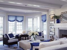 a living room with blue and white decor