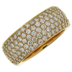 This fabulous Cartier 5-row wide band ring is crafted in 18k yellow gold and pave-set with brilliant-cut round D-E-F VVS1-VVS2 diamonds weighing an estimated 2.0 carats. Made in France circa 2020s. Measurements: 0.31" (8mm) width. The ring size is 6.75 - EU 54. Non-resizable. Excellent condition. Comes with original box and paperwork. Gold Band Ring, Ring Pictures, Wide Band Rings, Wide Bands, Gold Band, Ring Box, Diamond Clarity, Pave Diamonds, Gold Bands