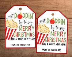 two christmas gift tags with popcorn on them