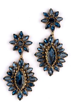 Exude extreme sparkle in these tonal crystal drop earrings anchored by floral clusters sure to make a glamorous statement. 2" drop, 1" width Post back Steel post back Goldtone plate/leather/glass/cotton Imported 1940s Makeup, Deepa Gurnani, Handcrafted Accessories, Steel Post, Crystal Drop Earrings, Earrings Blue, Crystal Drop, Handmade Fashion, Trendy Jewelry