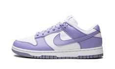 The Women’s Nike Dunk Low Next Nature “Lilac” is a women’s-exclusive colorway of the vintage basketball shoe made from at least 20% recycled content by weight.  The eye-pleasing “Lilac” colorway was released as part of the “Move to Zero” campaign by Nike that aims to reduce the brand’s carbon footprint.  The shoe features a white leather base with Lilac-colored leather overlays and Swoosh branding.  White “Nike” embroidery appears on the heel.  Lilac “Nike” and Swoosh detailing can be found on t Women’s Nike Dunks Low, Nike Purple Shoes, Light Purple Dunks, Lilac Dunks, Nike Dunks Purple, Dunks Purple, Nike Shoes Purple, Light Purple Shoes, Purple Dunks