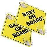 two yellow baby on board signs sitting next to each other in front of a white background