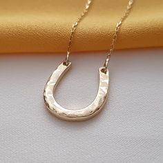 10k 14k Solid Gold Horseshoe Necklace, Lucky Charm Horseshoe Pendant, Women Necklace,Christmas Gift Necklace,Valentines Day Gift Necklace The necklace is made of 10k 14k solid gold according to your preference.  All the pieces in the necklace are solid gold..                                                              We use lobster clasp on the chain..         The chain thickness is 0.85mm.       Pendant height: 15 mm  Pendant width : 14 mm The chain is produced adjustable..  For example: 22 i Horseshoe Necklace Gold, Birthday Necklace Gift, Horseshoe Pendant, Horseshoe Necklace, Valentines Necklace, Lucky Charm, Gift Necklace, Womens Necklaces, Charm Necklace