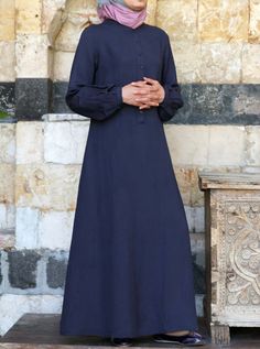 Full length Round neckline Front breastfeeding-friendly buttoned neck opening Flared sleeve below hem with buttoned cuff Raglan sleeves A-line cut item Code: wD2671 Model is 168cm (5 feet 6 inches) and wearing size M. Minimalistic Dress, Jersey Hijab, Islamic Clothing, Sleeve Maxi Dress, Flared Skirt, Maxi Dress With Sleeves, Comfortable Dress, Different Fabrics, Body Size