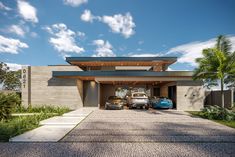 two cars parked in front of a modern house