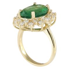 Stamped: 14K Yellow GoldTotal Ring Weight: 7.2 GramsRing Length: N/ARing Width: N/AGemstone Weight: Total Natural Emerald Weight is 5.72 Carat (Measures: 13.58x10.65 mm)Color: GreenDiamond Weight: Total Natural Diamond Weight is 1.05 CaratColor: F-G, Clarity: VS2-SI1Face Measures: 22.20x18.63 mmSku: [704082W] Oval Yellow Gold Gemstones With Halo Setting, Formal Yellow Gold Cluster Ring With Emerald, Luxury Oval Cluster Ring Stamped 14k, Luxury Stamped 14k Oval Cluster Ring, Formal Marquise Yellow Gold Emerald Ring, Marquise Emerald Ring With Prong Setting For Formal Occasions, Formal Marquise Emerald Ring With Prong Setting, Formal Emerald Yellow Gold Rings, Elegant Emerald Ring Stamped 14k